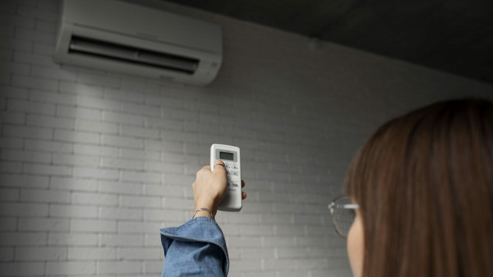 young woman using home technology